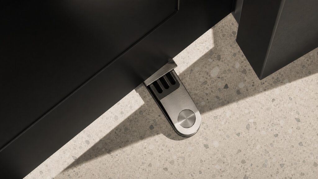 Security door wedge braced beneath a hotel door