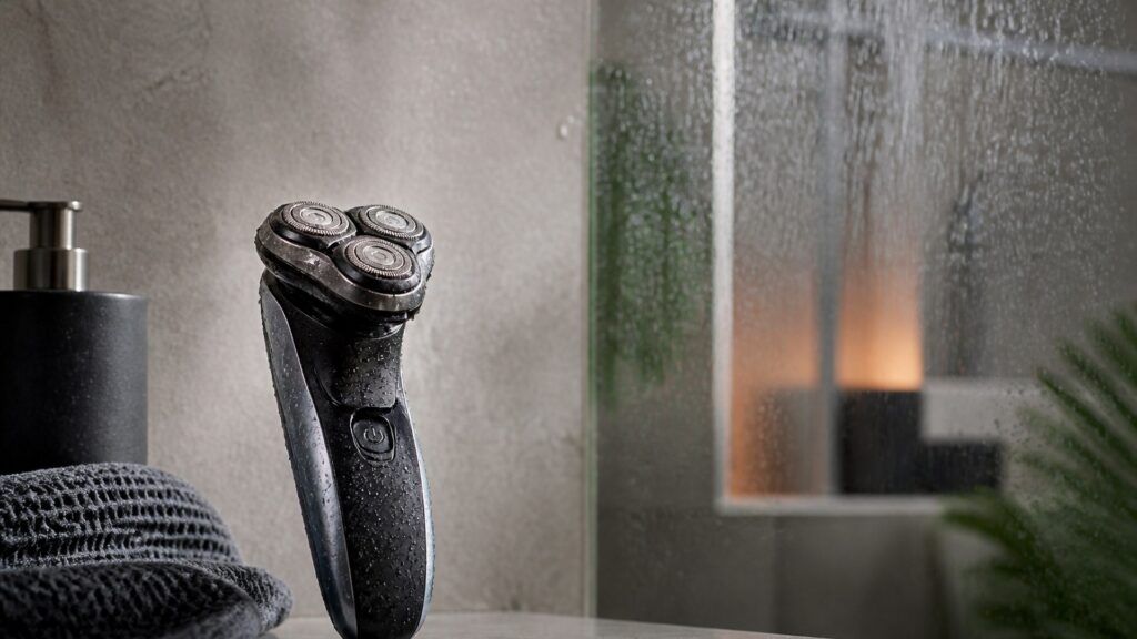 Unbranded editorial arrangement illustrating Electric Shavers Buying Guide for Shower Use