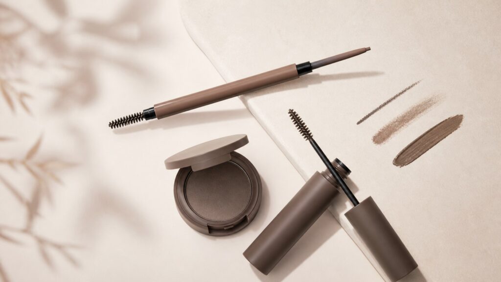 Unbranded editorial arrangement illustrating How to Choose Brow Products for Mature Skin