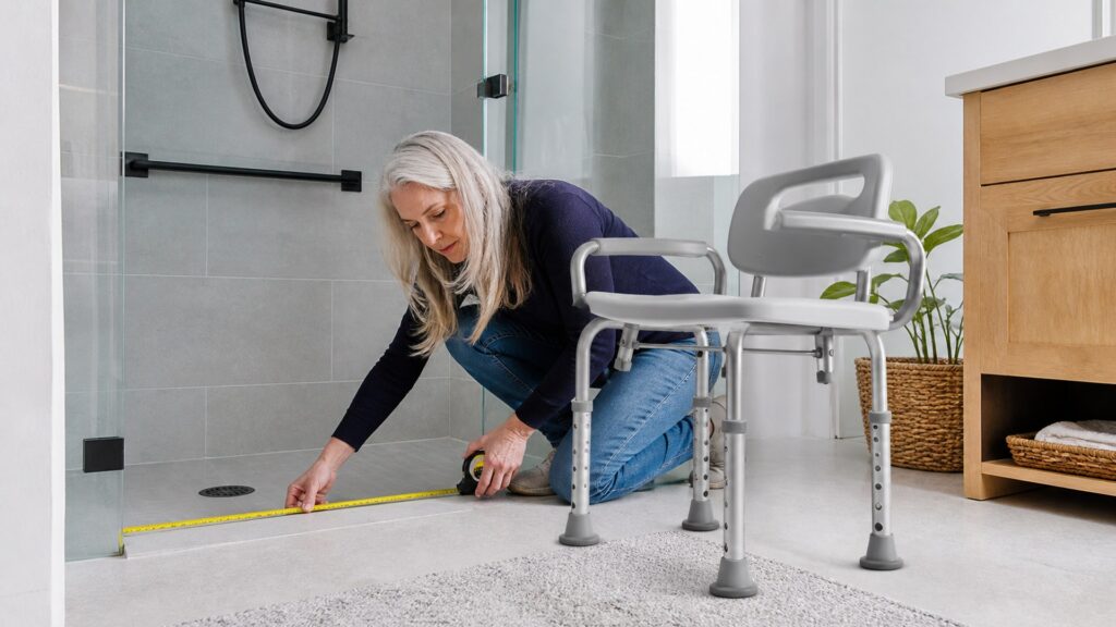 Unbranded shower chairs arranged to compare backrest and arm configuration and transfer-side clearance