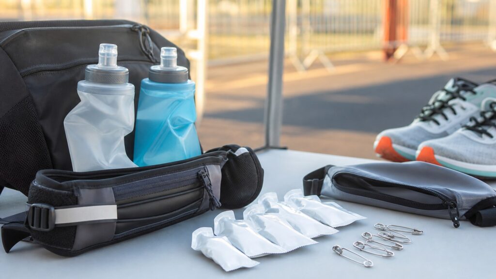 hydration and fueling gear for race day arranged in a practical buyer guide scene