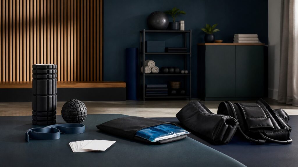 People-free editorial still life illustrating a broad functional category versus powered massage
