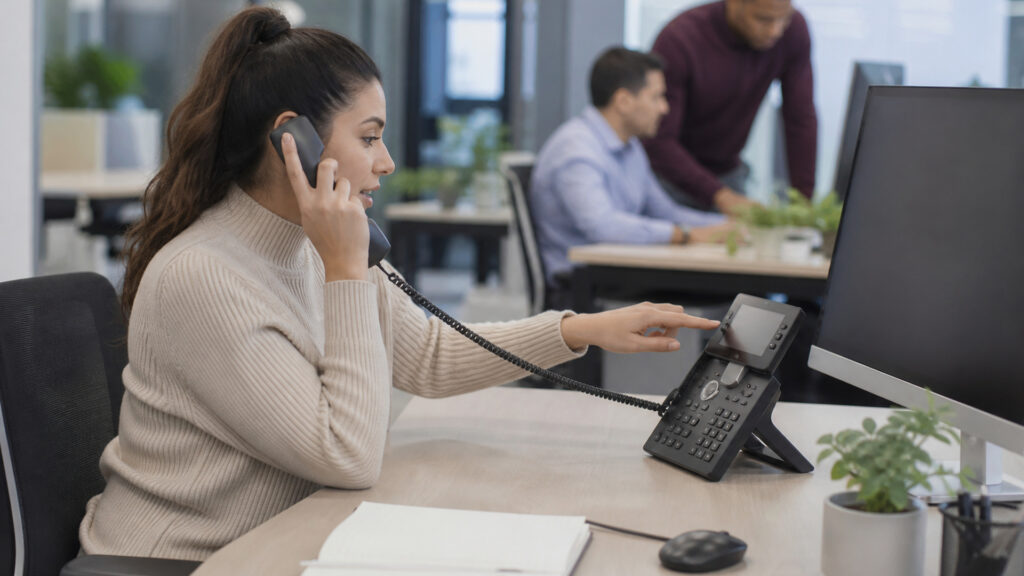 Editorial business scene illustrating business virtual phone numbers workflow role